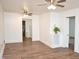 Bright living room with new laminate flooring, white walls and ceiling fans in every room at 540 S Cheatham St, Franklinton, NC 27525