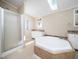 Bright bathroom featuring a shower, soaking tub, and vanity with neutral countertops and plenty of natural light at 55 J B Rd, Louisburg, NC 27549