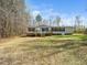 Charming single-level home with a welcoming front porch and well-maintained lawn at 55 J B Rd, Louisburg, NC 27549