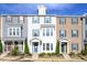Inviting townhome showcases multiple units with colorful facades and manicured landscaping, great location at 5918 Giddings St, Raleigh, NC 27616