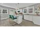 Updated kitchen with granite countertops, stainless steel appliances, and breakfast bar at 602 Dunbar St, Durham, NC 27701