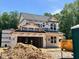 New two-story home featuring a garage and lots of natural light ready for customization and landscaping at 61 Fetterbush Way, Clayton, NC 27520