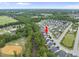 Aerial view of a well-planned community featuring tree-lined streets and single-Gathering homes at 622 Lone Pine Loop, Fuquay Varina, NC 27526