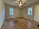 Cozy bedroom with hardwood floors, natural light, and a soothing atmosphere for rest at 640 Crocker Rd, Smithfield, NC 27577