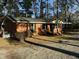 One-story brick home with a ramp, black shutters, and a covered entry for convenience at 640 Crocker Rd, Smithfield, NC 27577
