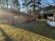 Rear view of a well-maintained brick home showing the spacious backyard and sunny exposure at 640 Crocker Rd, Smithfield, NC 27577