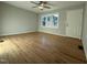 Inviting living room with hardwood floors, a modern ceiling fan and a welcoming ambiance at 640 Crocker Rd, Smithfield, NC 27577