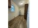 A utility room has dark flooring, light walls and a water heater at 640 Crocker Rd, Smithfield, NC 27577