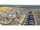 Aerial view of a residential community with houses and townhomes at 6412 Nurture Ave, Raleigh, NC 27616