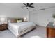 Bright bedroom with a king-sized bed, neutral decor, ample natural light, and side tables at 6412 Nurture Ave, Raleigh, NC 27616