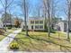 Charming home featuring a well-maintained lawn and mature trees at 7109 River Birch Dr, Raleigh, NC 27613