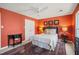 Bedroom features carpet, red walls, closet and two windows with natural light at 7109 River Birch Dr, Raleigh, NC 27613