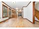 Dining room with hardwood floors, natural light, and access to the kitchen and living room at 7212 Rabbit Run, Wake Forest, NC 27587