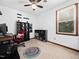 Bright bedroom with natural light from window, black shelving, and carpeted floors at 7301 Turtleneck Ct, Raleigh, NC 27616