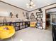 Bright room featuring stylish decor, comfortable seating, and ample storage for books and records at 7301 Turtleneck Ct, Raleigh, NC 27616