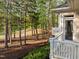 Back deck with views of the wooded landscape and golf course, providing a serene outdoor living space at 73214 Burrington, Chapel Hill, NC 27517