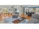 Open-concept living space with hardwood floors, ample natural light, and stylish furnishings at 73214 Burrington, Chapel Hill, NC 27517