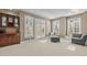 Bright living room features built in bar area, neutral colors, and lots of natural light at 73214 Burrington, Chapel Hill, NC 27517