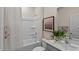 Clean bathroom offers a shower-tub combo with picture and plant detail at 7750 Michelle Rd, Rocky Mount, NC 27803