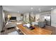 Open concept living, dining, and kitchen space in a well-lit home at 7750 Michelle Rd, Rocky Mount, NC 27803