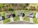 Aerial view showcasing three homes with well-maintained yards in a Gathering-friendly neighborhood at 825 Golden Plum Ln, Zebulon, NC 27597
