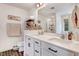 Bright bathroom with double sinks, quartz countertops and a glass enclosed shower at 825 Golden Plum Ln, Zebulon, NC 27597
