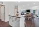 Spacious kitchen island adjoining dining area with views into living room at 825 Golden Plum Ln, Zebulon, NC 27597