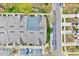 Birds eye view of townhomes showing parking and landscaping at 8641 Neuse Club Ln # 110, Raleigh, NC 27616