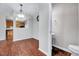 Open-concept living space with dining area and half bathroom at 8641 Neuse Club Ln # 110, Raleigh, NC 27616