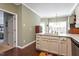 Bright kitchen with a sink and ample counter space, connecting seamlessly to other areas at 8701 Neuse Village Ct, Raleigh, NC 27616