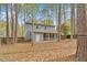 The back of the house has a screened porch and a wooded backyard, offering a peaceful retreat at 1010 Flanders St, Garner, NC 27529
