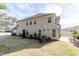 Spacious backyard with a lawn and patio, perfect for outdoor living and entertaining guests at 1012 Catch Fly Ln, Durham, NC 27713