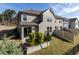 Backyard with a fenced lawn, small garden, and a view of the home's rear exterior at 1012 Catch Fly Ln, Durham, NC 27713