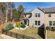 Overhead view of the backyard showing the lawn, garden, and fencing details of the property at 1012 Catch Fly Ln, Durham, NC 27713