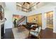 Spacious living room showcases high ceilings, open floorplan, hardwood floors, and a fireplace for a cozy atmosphere at 1012 Catch Fly Ln, Durham, NC 27713