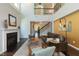 Spacious living room boasts a fireplace, hardwood floors, and open layout with high ceilings and plenty of natural light at 1012 Catch Fly Ln, Durham, NC 27713