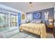 Bright bedroom with access to a screened porch offering serene outdoor views at 103 Morningside Dr, Carrboro, NC 27510