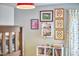 Charming bedroom featuring a decorative wall art display and a bookcase with books at 103 Morningside Dr, Carrboro, NC 27510