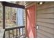 Close-up of the front door with a video doorbell and outdoor lighting at 103 Morningside Dr, Carrboro, NC 27510