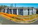 New construction of multi-Gathering building with gray siding and architectural details at 110 Bellamy Ln # 102, Chapel Hill, NC 27516