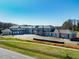 New two-story home construction is well underway on a sunny day at 110 Bellamy Ln # 108, Chapel Hill, NC 27516