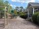 A colorful playground sits adjacent to the community building's manicured lawn at 110 Bellamy Ln # 207, Chapel Hill, NC 27516