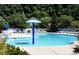 Community pool featuring plenty of lounge chairs and open space for residents to enjoy at 110 Bellamy Ln # 207, Chapel Hill, NC 27516