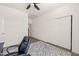 Bedroom features a ceiling fan, large closet, and modern decor at 1121 White Oak Creek Dr, Apex, NC 27523