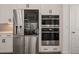 Stainless steel LG refrigerator and double ovens are featured in this modern kitchen at 1121 White Oak Creek Dr, Apex, NC 27523