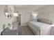 Delightful bedroom featuring a single bed, soft pink accents, and a view of a spacious closet at 1130 Winding Spring Dr, Mebane, NC 27302