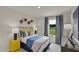 Charming bedroom with a single bed, striped curtains, hardwood floors, a bright yellow nightstand, and natural light at 1130 Winding Spring Dr, Mebane, NC 27302