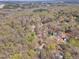 Aerial view showcases a neighborhood with large trees dotting the landscape at 1133 Turner Farms Rd, Garner, NC 27529