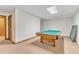 Basement rec room with a wooden pool table at 1133 Turner Farms Rd, Garner, NC 27529