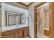 Bathroom with a large vanity, sink, mirror, and view into an adjoining shower room at 1133 Turner Farms Rd, Garner, NC 27529
